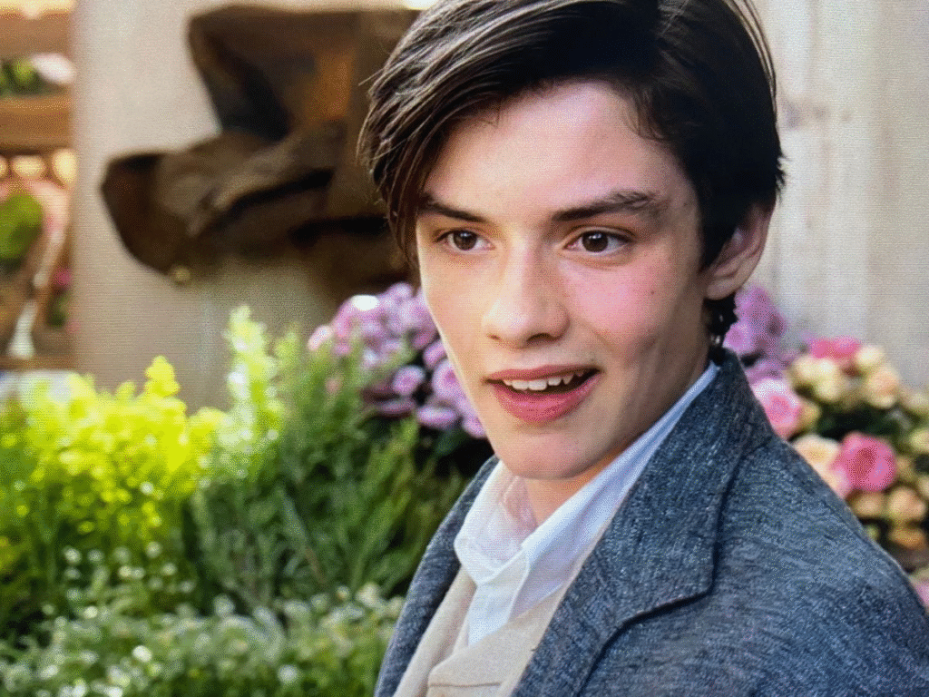 Louis Partridge age overview at a red carpet event